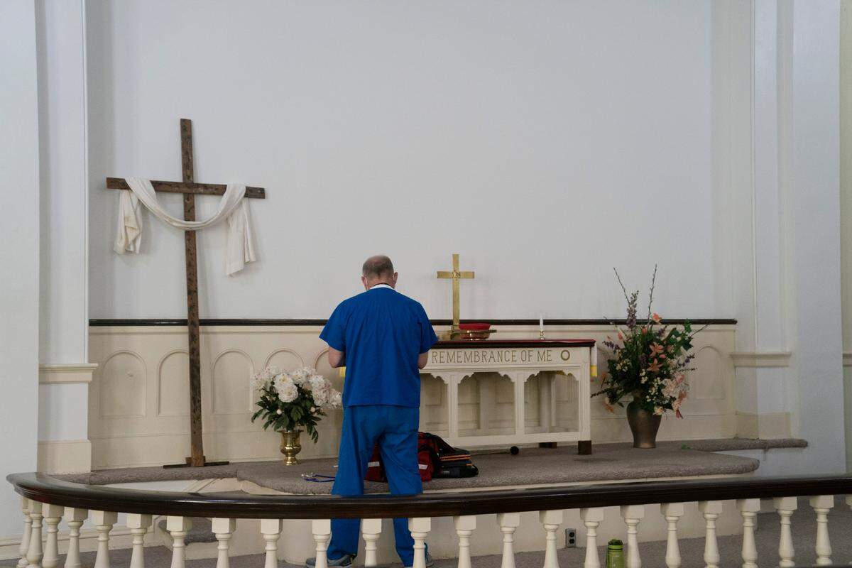 A healthcare worker prepares the sanctuary to be the site to observe those vaccinated for 15 minutes on Thursday, April 8, 2021 at Safehouse in Columbus, Ga.