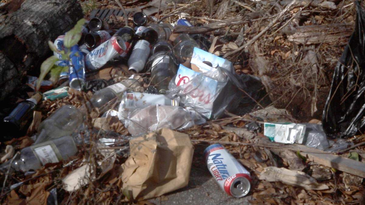 An empty lot off of Forrest Rd. is scattered with trash on Jan. 7, 2022, in Columbus, Ga.