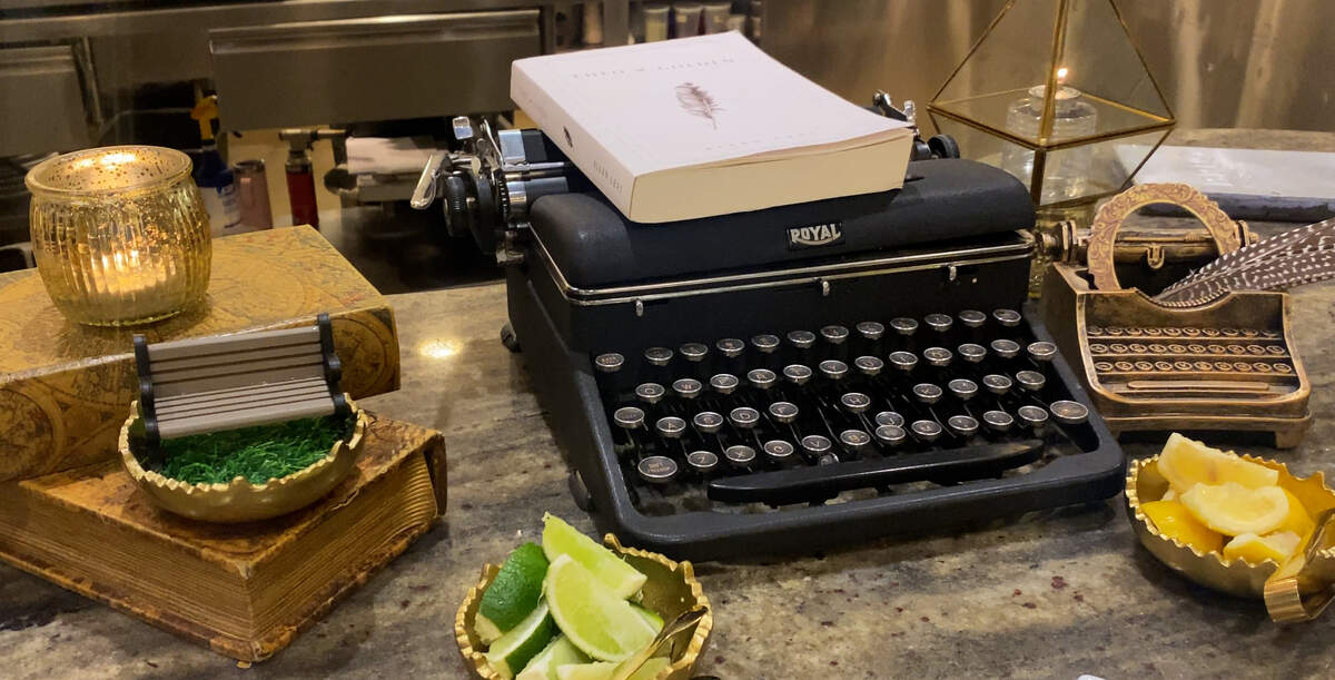 Sitting at the Epic Restaurant chef’s table in Columbus, “Theo of Golden” fan Linda Brandt said she immediately saw Epic’s attention to detail: a typewriter on a table, a copy of the bestselling novel placed atop the typewriter, a bench, feathers and more.