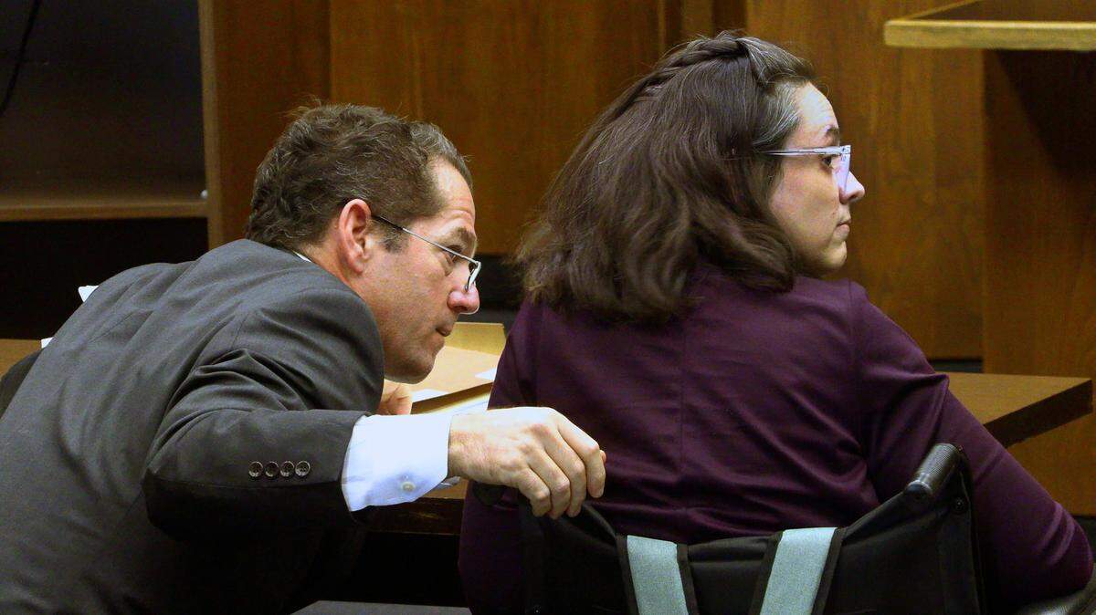 Kim Golden, right, and attorney Thomas Gristina, an attorney representing the Columbus Consolidated Government, listen to a question posed by Edward Murray during a Friday afternoon hearing before Judge John Martin in Columbus, Georgia. 03/31/2023