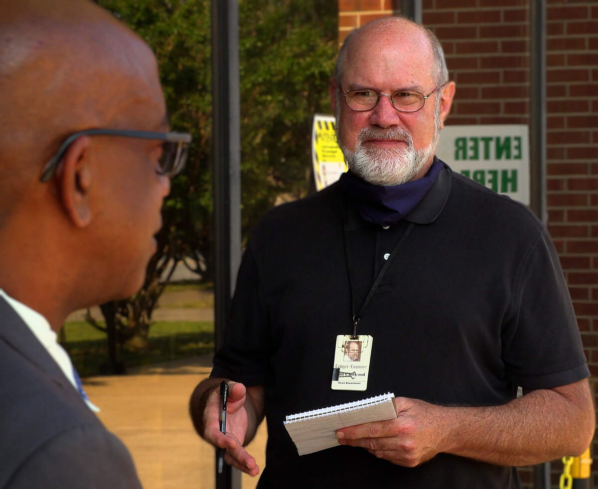 Ledger Enquirer reporter Tim Chitwood interviews defense attorney Shevon Sutcliffe Thomas after a hearing for one of Thomas’ clients in Columbus Recorder’s Court in Columbus, Georgia in May of 2021.