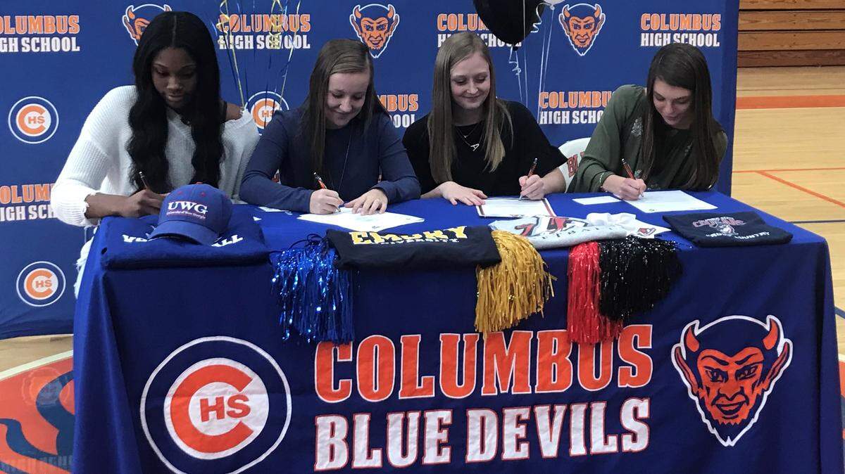 During a ceremony Thursday at Columbus High School, four senior student athletes signed college scholarships. They are, from left, Tierra White, volleyball, University of West Georgia; Amanda Pate, softball, Emory University; Avery Hooper, softball, LaGrange College; Hannah Hutchens, cross country, Columbus State University.