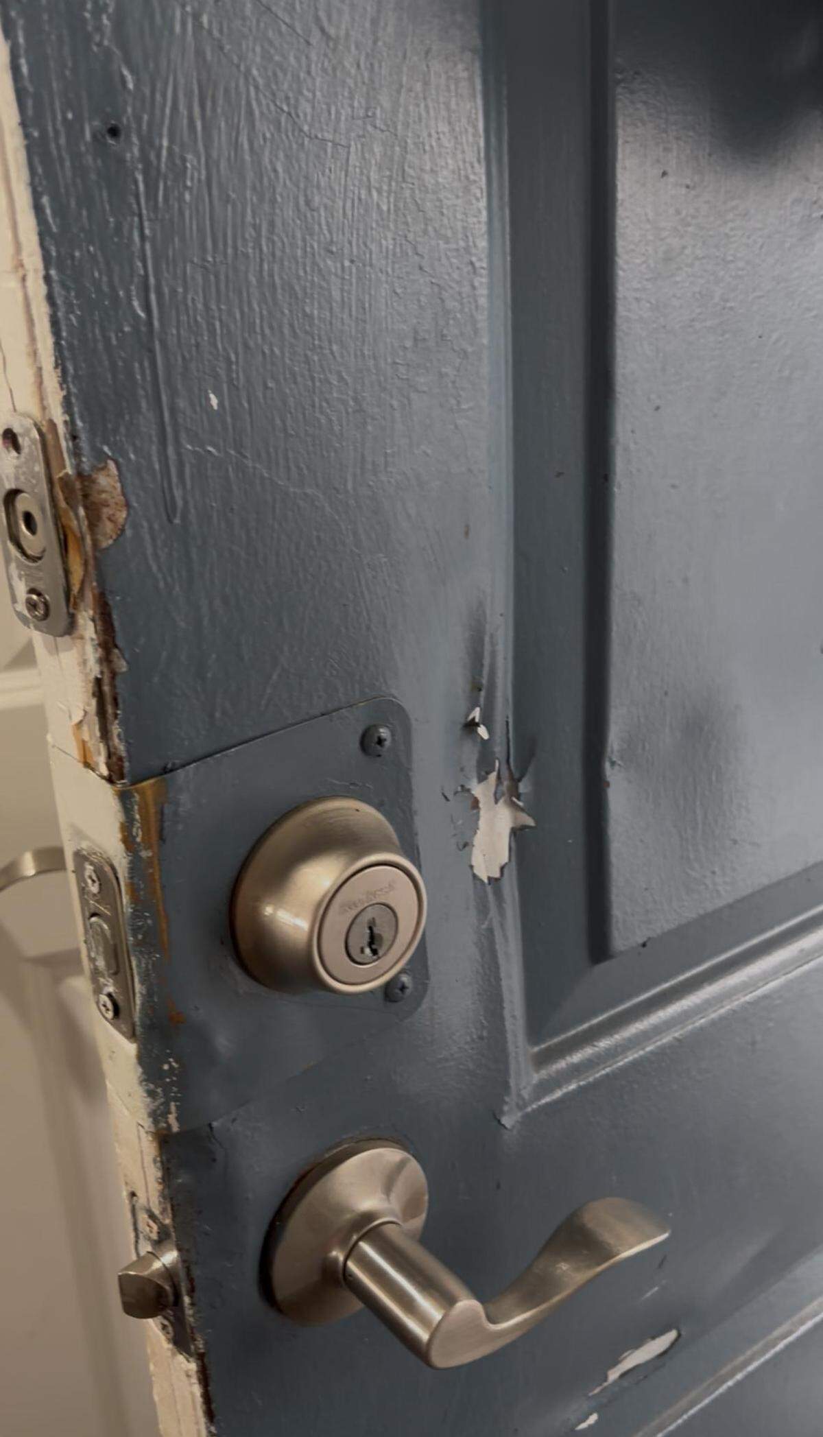 Allison Bustillo, 20, was detained by ICE in February 2025 after the FBI and other law enforcement raided her family’s apartment looking for a former tenant. This photo shows the family’s door after agents kicked it to get inside. Bustillo was detained in Stewart Detention Center for over six months.