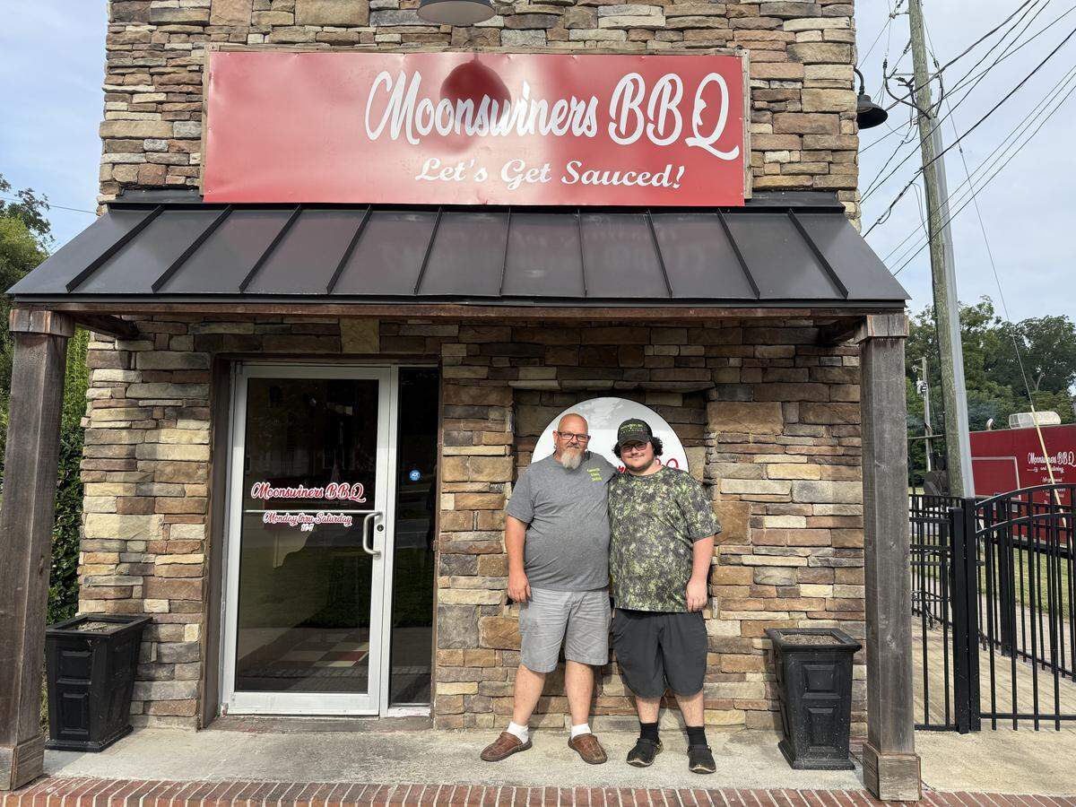 Scott Marshall owns Moonswiners BBQ, 547 Veterans Parkway in Columbus. He is pictured here with his son, Todd Marshall, on Aug. 28, 2025.