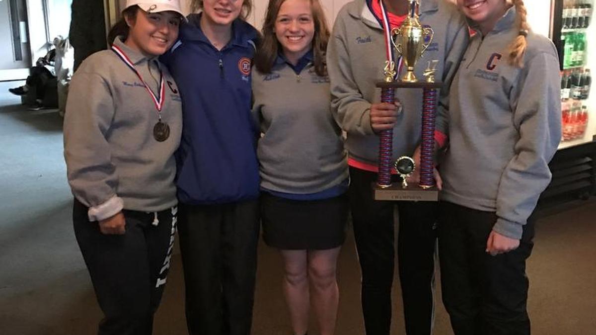 Columbus high school golfers Mary Catherine McDaniel, Boyd Bickerstaff, Ashton Hill, Faith Scott and Maddy Krueger celebrate their victory in the Northside Invitational on March 14, 2017.