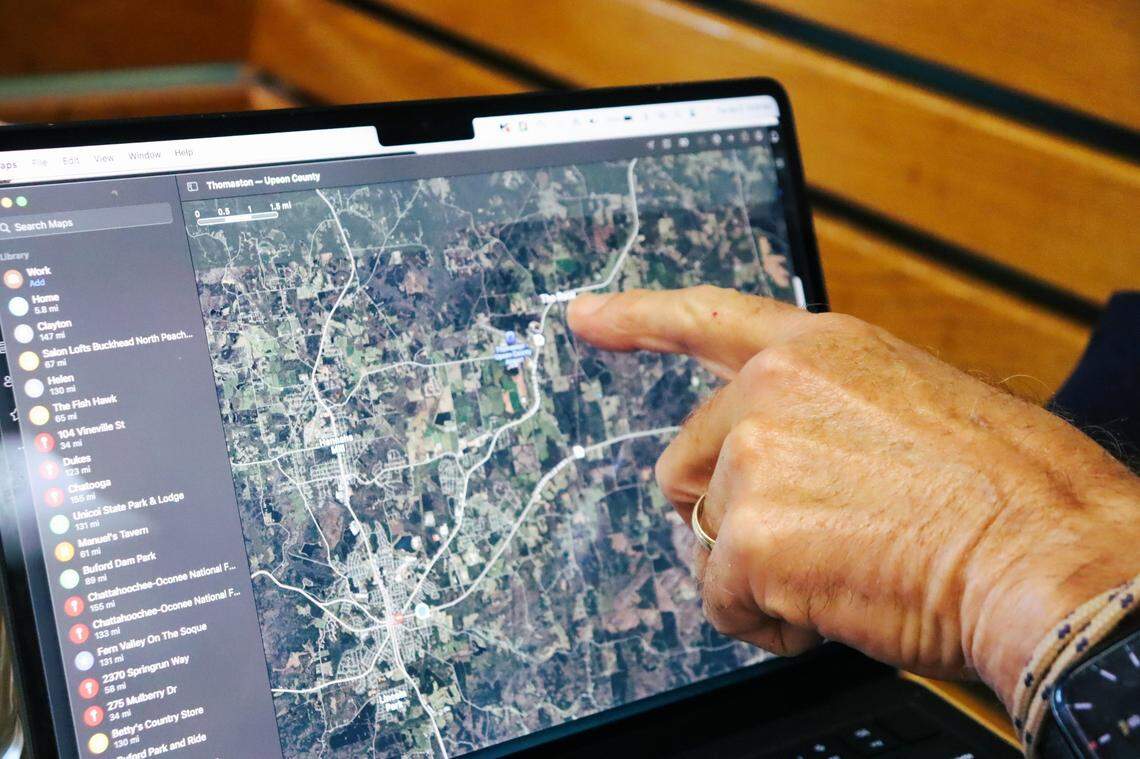 Mike Greenman points to a neighborhood where there is a volunteer fire department. It’s close to his home and the industrial land where Brightmark would construct its plastic waste plant.