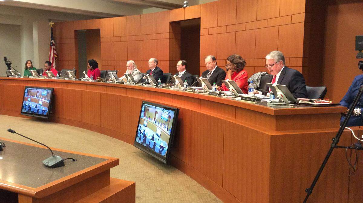 Muscogee County School Board representative Frank Myers of District 8, far right, and John Thomas of District 2, third from right, read their farewell speeches during the board’s monthly meeting Dec. 17, 2018, in the Muscogee County Public Education Center.