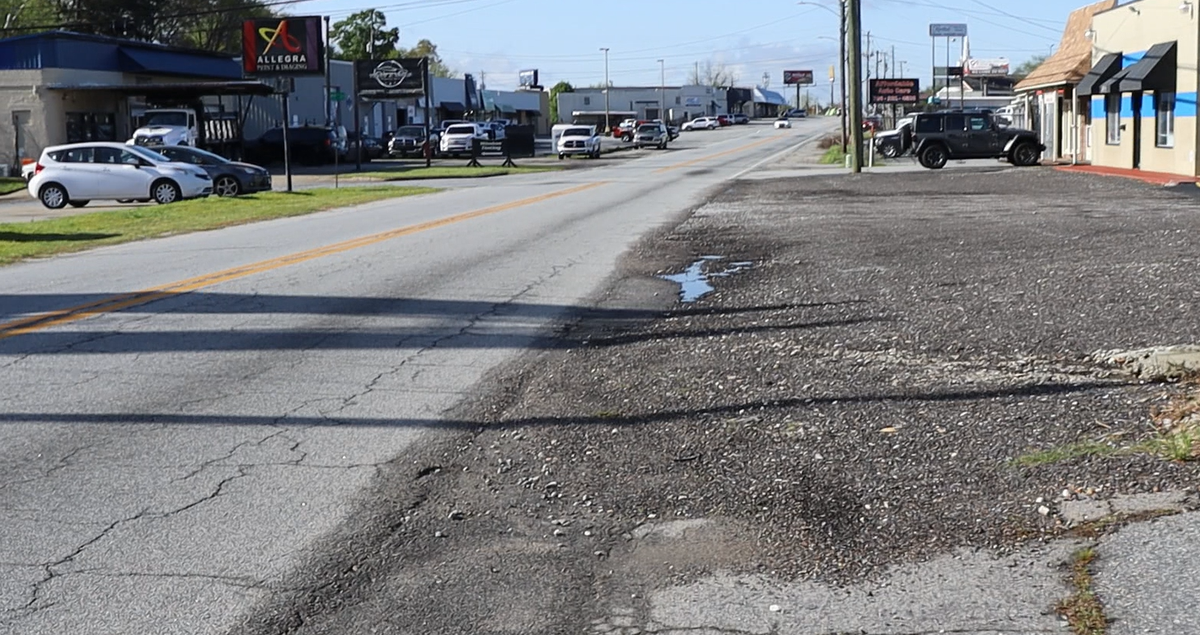 Hamilton Road and 50th Street, Columbus, Georgia with no sidewalk. March 25, 2024. The speed limit for cars is 35 mph.