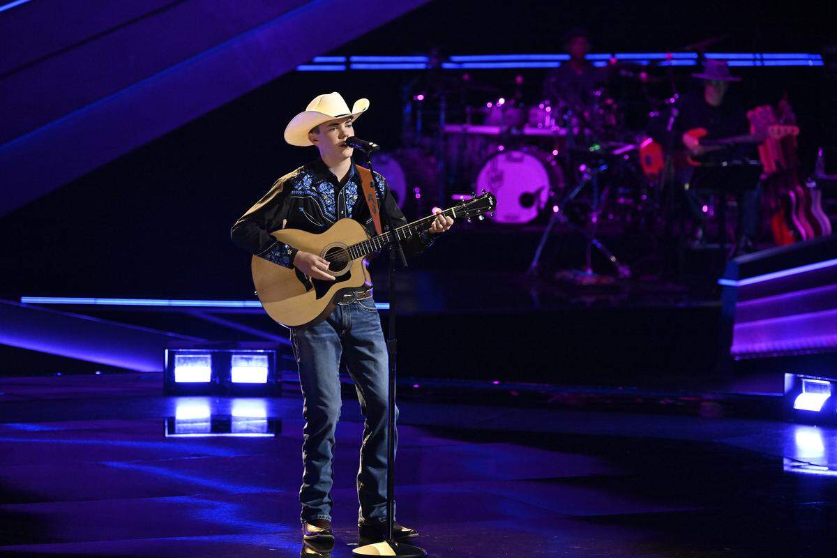 AJ Robinson of Cataula in Harris County, a ninth-grader at Calvary Christian School in Columbus, performs on stage at Universal Studios in Hollywood, California, during the Feb. 23, 2026, episode of the singing competition TV show “The Voice” on NBC.