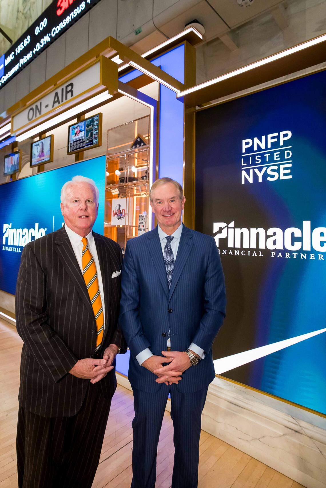 Pinnacle Financial Partners chairman Terry Turner, left, and CEO and president Kevin Blair were honored Jan. 13, 2026, at the New York Stock Exchange to celebrate the merger of Columbus-based Synovus with Nashville-based Pinnacle.