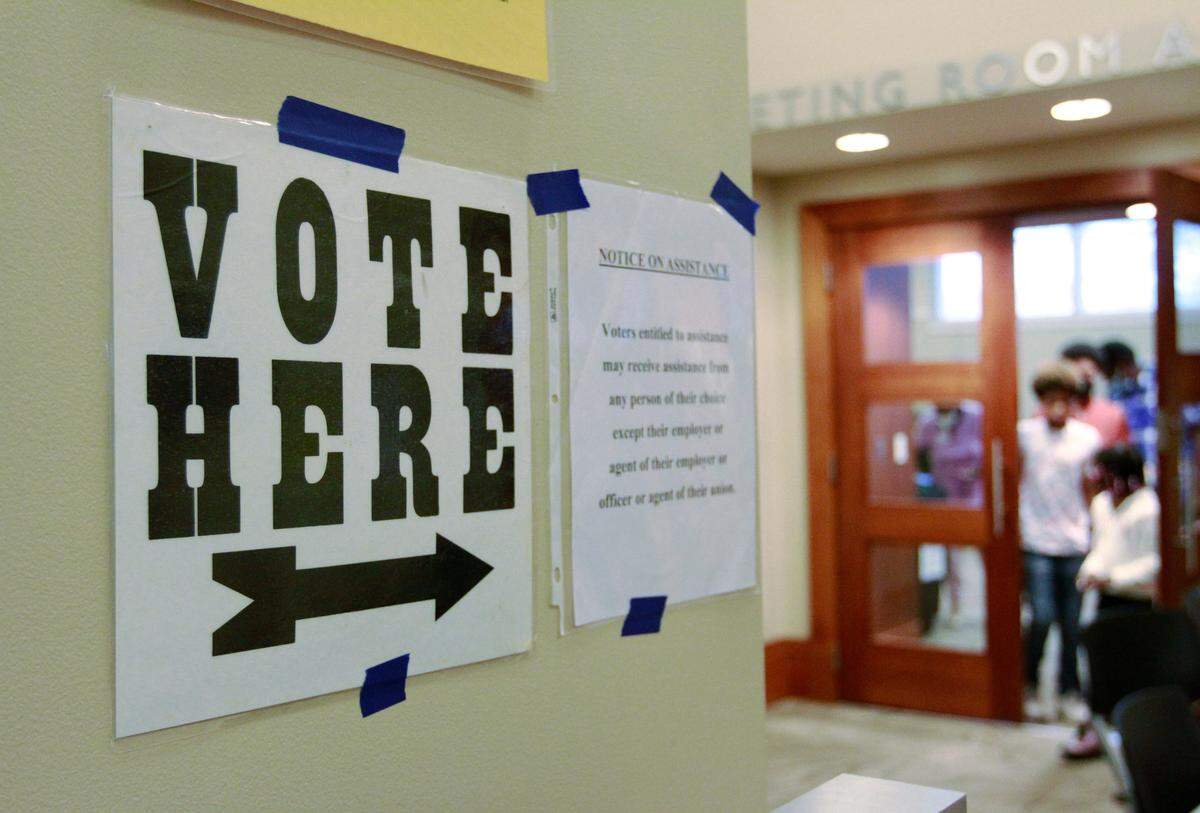 A voter leaves voting precinct 102 at the Columbus Public Library, 3000 Macon Road, in Columbus, Georgia, Tuesday morning. 11/08/2022