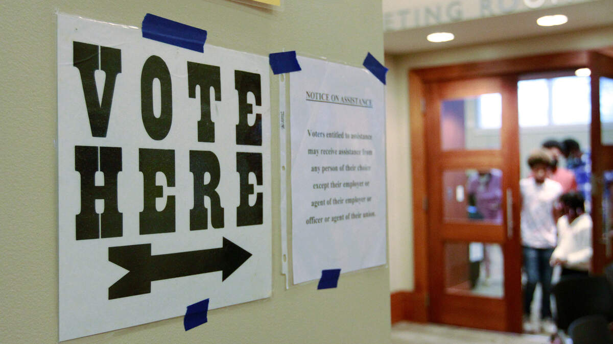 A voter leaves voting precinct 102 at the Columbus Public Library, 3000 Macon Road, in Columbus, Georgia, Tuesday morning. 11/08/2022