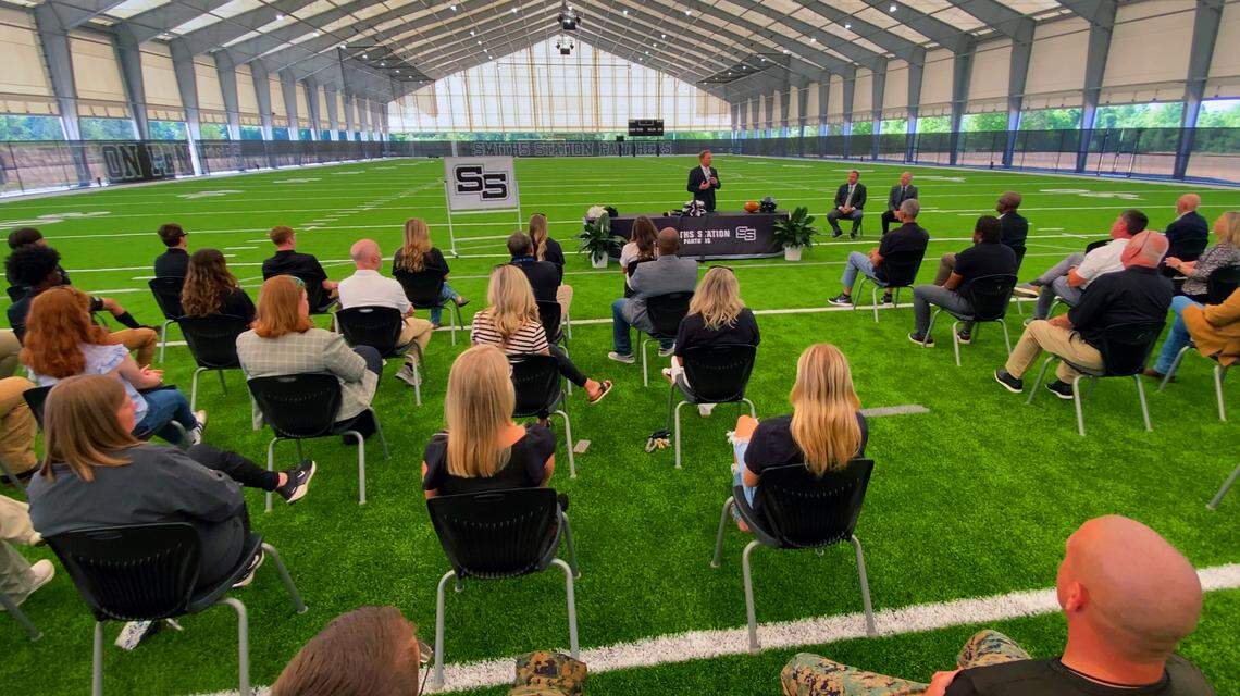 Smiths Station High School athletics director Bryan Eason speaks during a ribbon-cutting ceremony April 17, 2026, to celebrate completion of the school’s new Indoor MultiPurpose Athletics Complex.