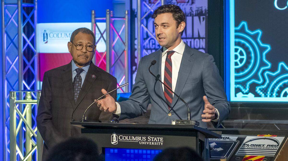 U.S. Senator Jon Ossoff, right, vows to protect Georgia’s foster children. FILE PHOTO