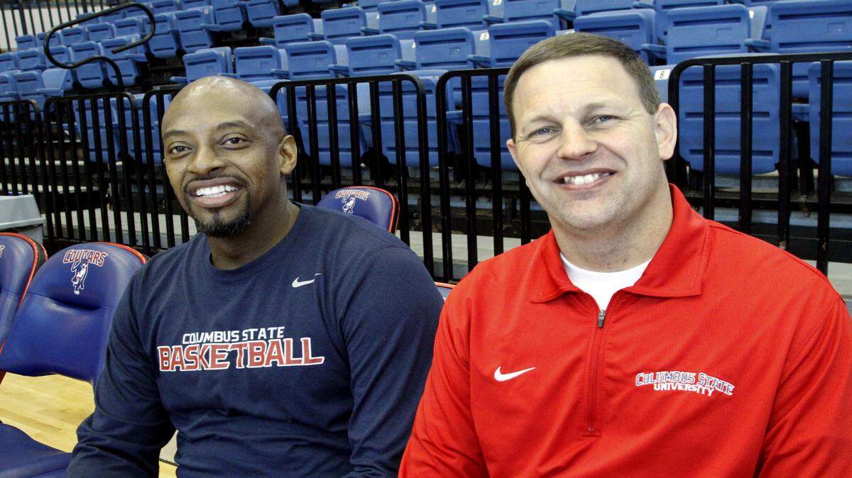 Columbus State University men's basketball coach Robert Moore, left, and women's basketball coach Jonathan Norton are preparing their teams for the Peach Belt Conference tournament opener at home at the Lumpkin Center. The Cougars and the Lady Cougars both enter the tournament as season conference champions.