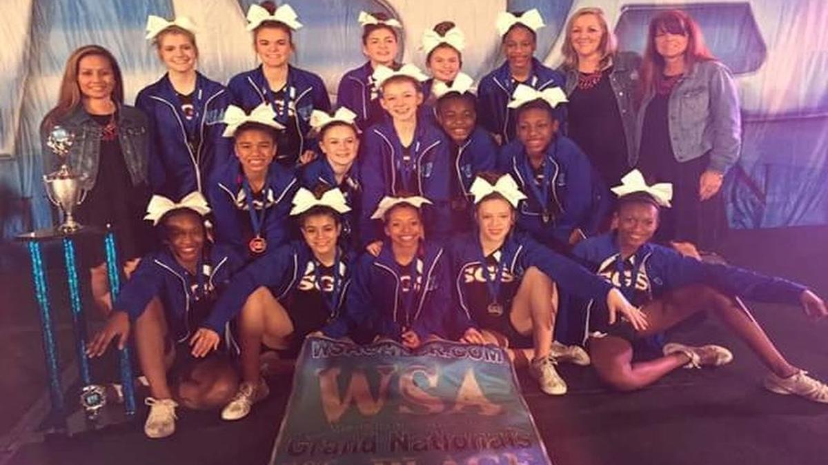 The South Girard Bulldogs celebrate their title at the WSA Grand Nationals in New Orleans, Louisiana, on March 12, 2017.