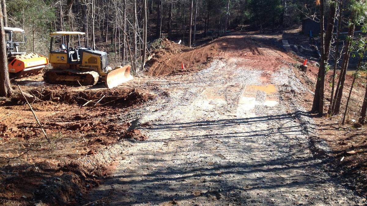 Mike Owen/mowen@ledger-enquirer.comHeavy equipment sits idle on the site of a dam restoration project caused by December's heavy rains.