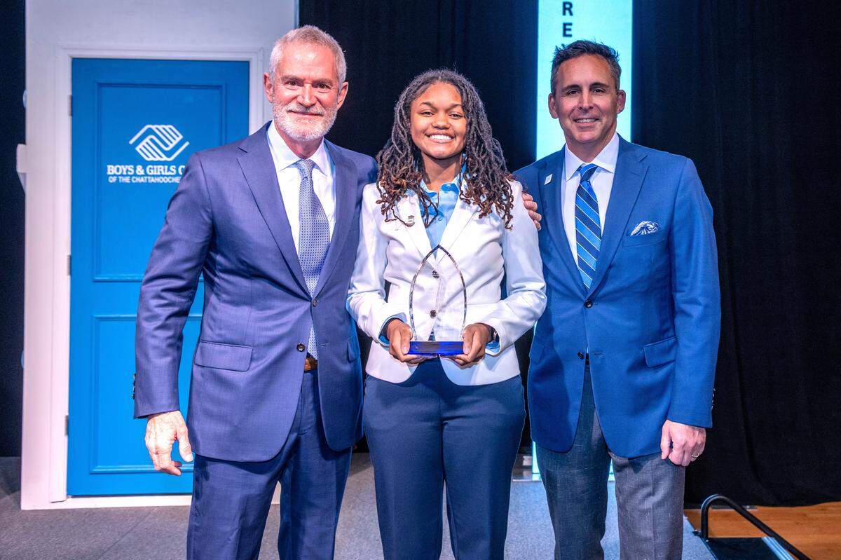 Carver High School senior Breyana Anyaegbunam was announced as the Boys and Girls Clubs of the Chattahoochee Valley Youth of the Year on Feb. 5, 2026, at the Bibb Mill Event Center in Columbus. After receiving the award, she poses with BGCCV board president Keith Pierce (left) and BGCCV CEO Fred Maglione.