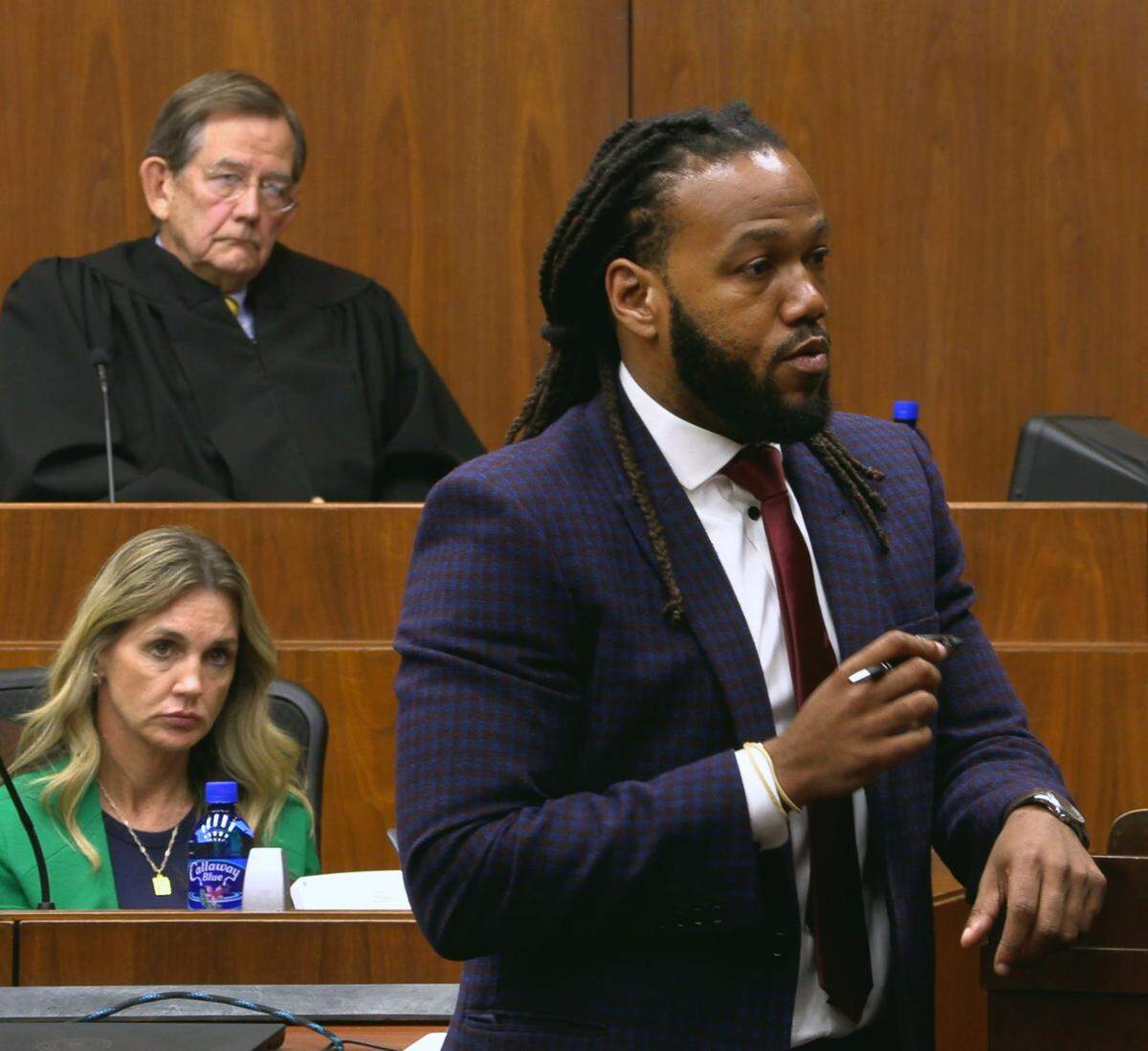 William Kendrick, right, defense attorney for Cyrus Howard Sr., makes his opening statement Tuesday morning.