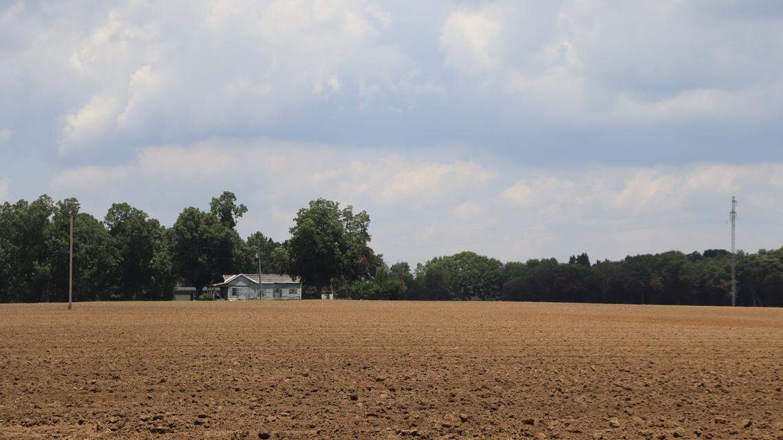 Dry soil stretches far on tilled farm in Americus, Georgia, in this June file photo. Farms and small businesses in Georgia are getting grant money to implement climate-friendly energy technology.