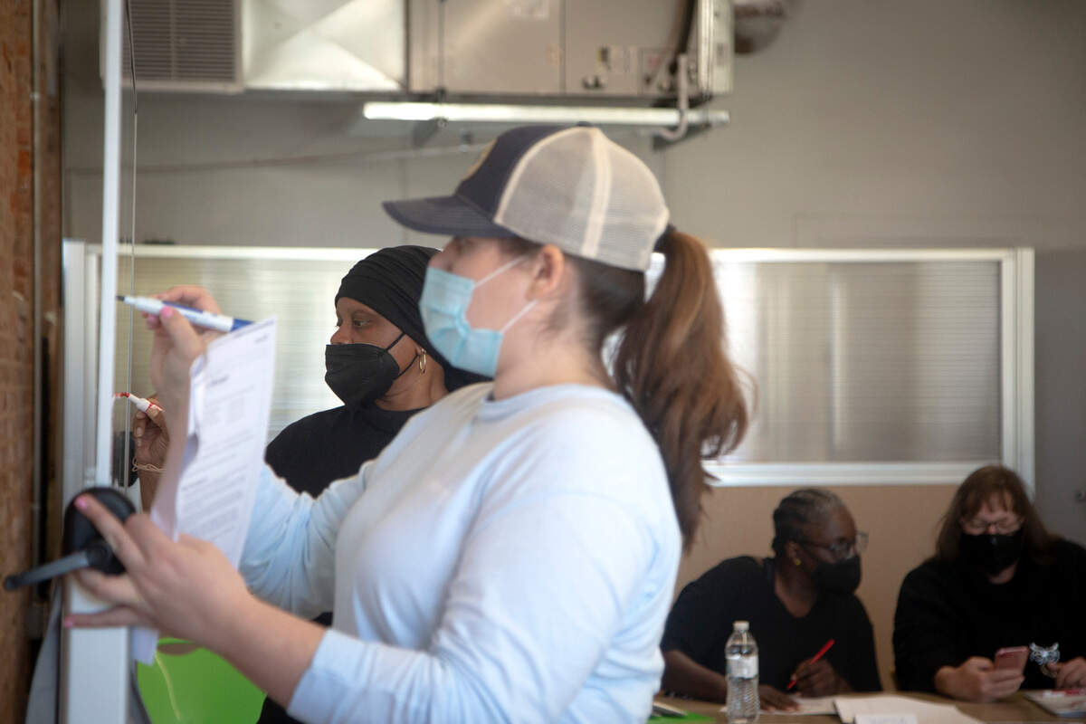 Dietcian Jamie Benefield, RD, and chef Tiffany Dunn instruct “Cooking Matters”, a course teaching sustainable and affordable food practices at The Food Mill in Columbus, Ga. on March 14, 2022.