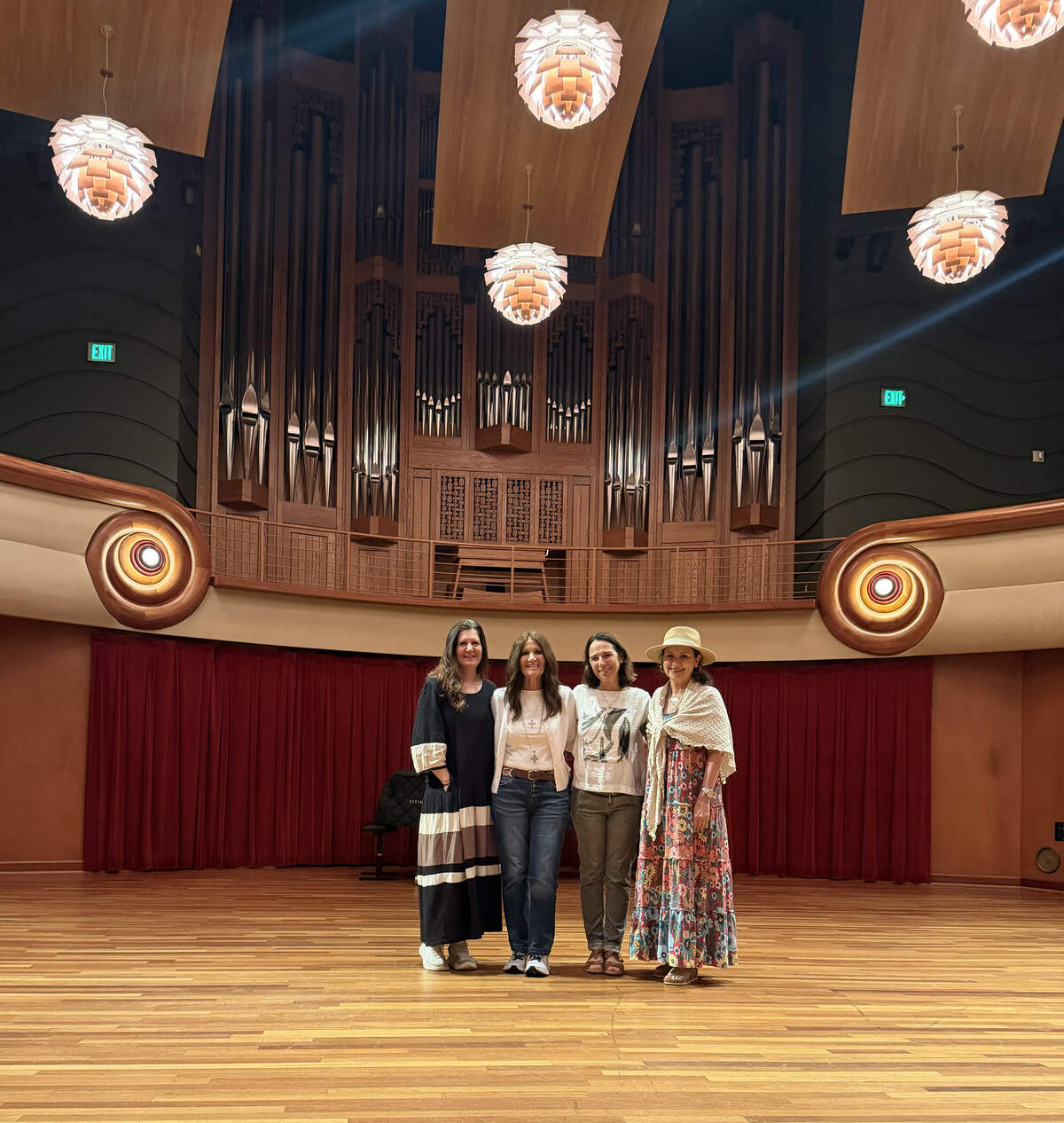 Visiting from Florida, the “THEO-logians” pose for a photo inside Legacy Hall at the RiverCenter for the Performing Arts in Columbus. They are Suzanne Mavrakos, Kim Crist, Linda Brandt and Roxanne Connor.