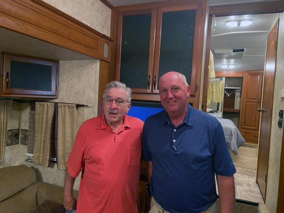 Captain Joe McCrea with the Muscogee County Sheriff’s Office, right, served as a technical advisor for the upcoming movie “Wash Me in the River,” directed by Randall Emmett and featuring Robert De Niro, left.