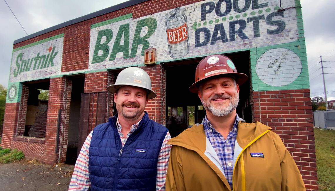 Martin Huff, partner, left, and Chris Woodruff, founder and CEO, of The Cotton Companies spoke recently about their redevelopment plans for the former Sputnik Bar in Columbus, Georgia. 11/11/2022
