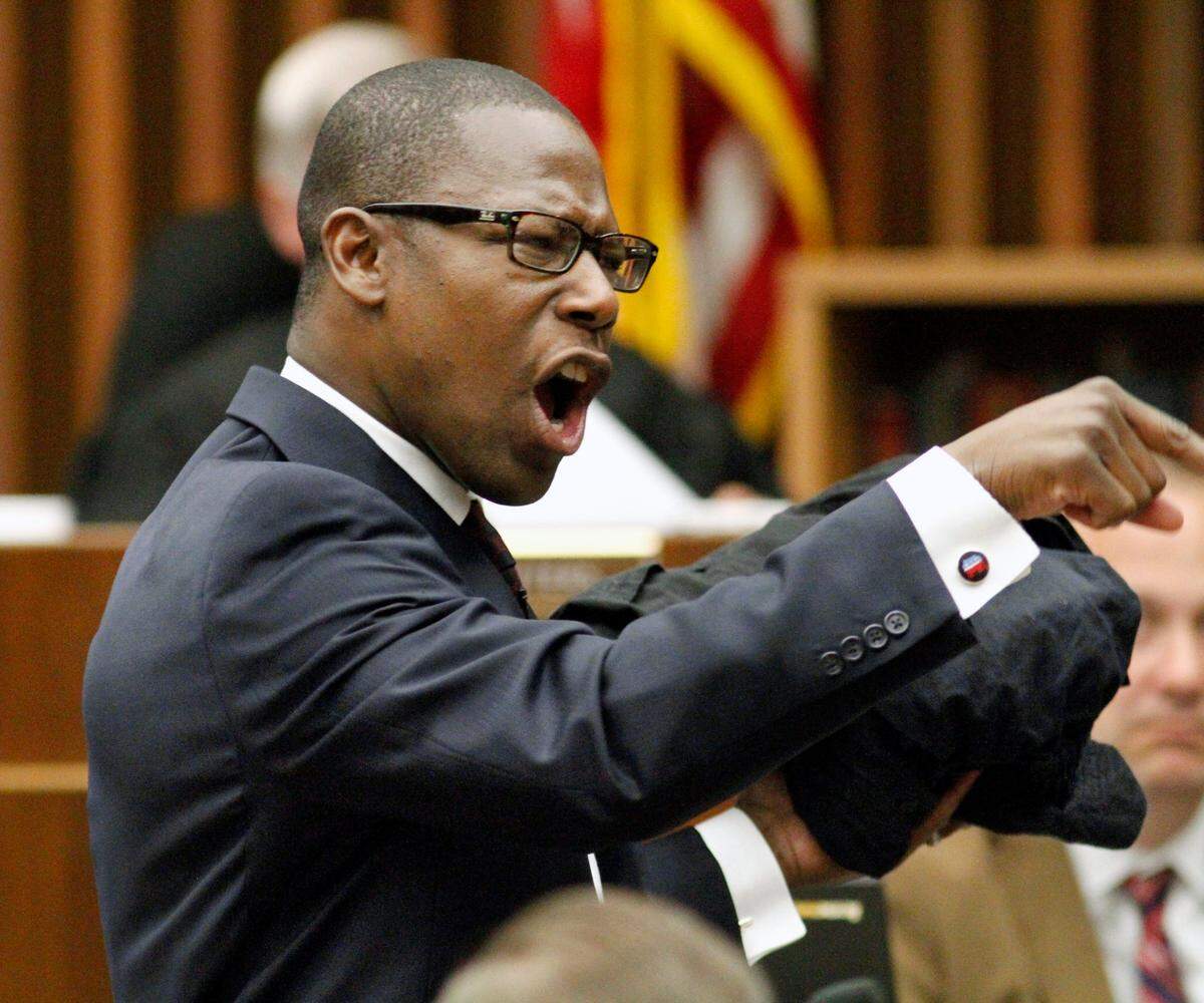 Attorney Stacey Jackson presents closing arguments in defense of his client Kareem Lane in Superior Court on September 4, 2014. Lane is being retried for murder in the 1992 stabbing death of former MCSD school superintendent Jim Burns.