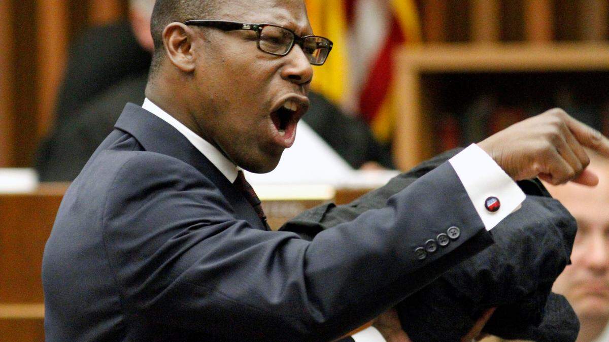 Attorney Stacey Jackson presents closing arguments in defense of his client Kareem Lane in Superior Court on September 4, 2014. Lane is being retried for murder in the 1992 stabbing death of former MCSD school superintendent Jim Burns.