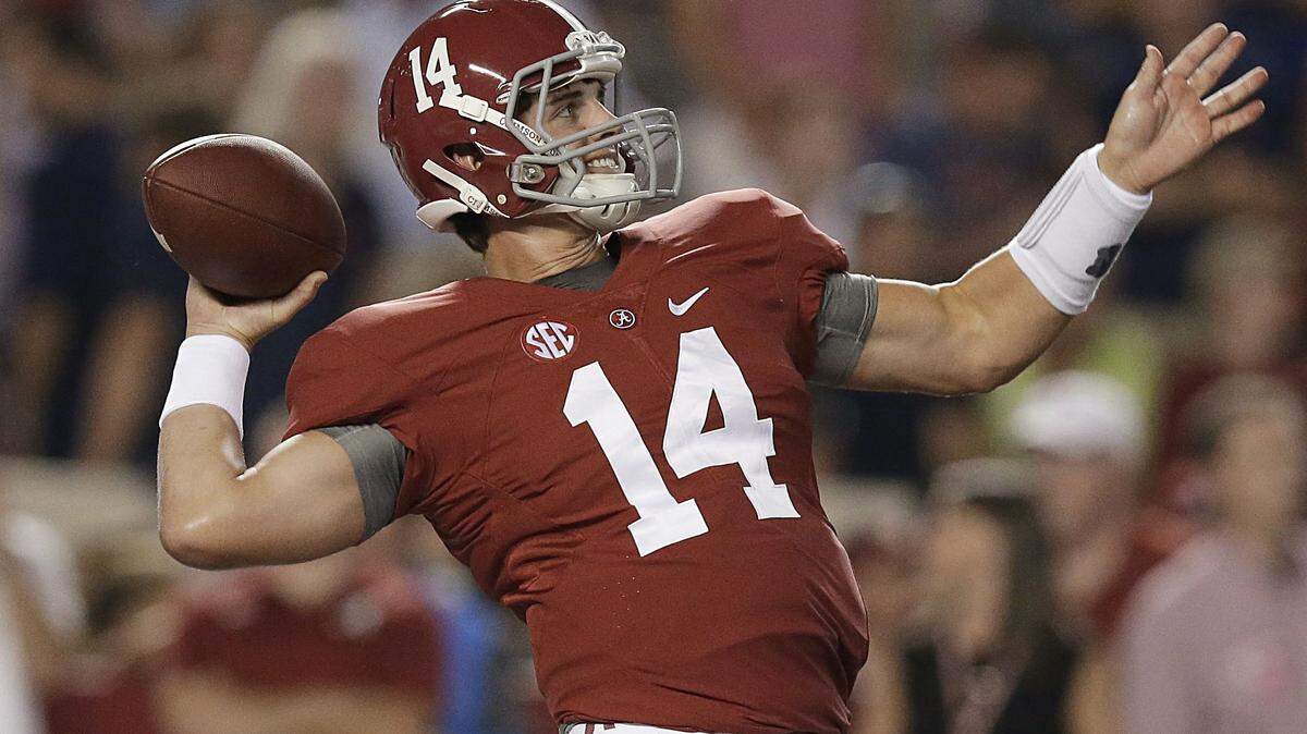 Alabama quarterback Jake Coker warms up for an NCAA college football game against Mississippi, Saturday, Sept. 19, 2015, in Tuscaloosa, Ala. (AP Photo/Brynn Anderson)