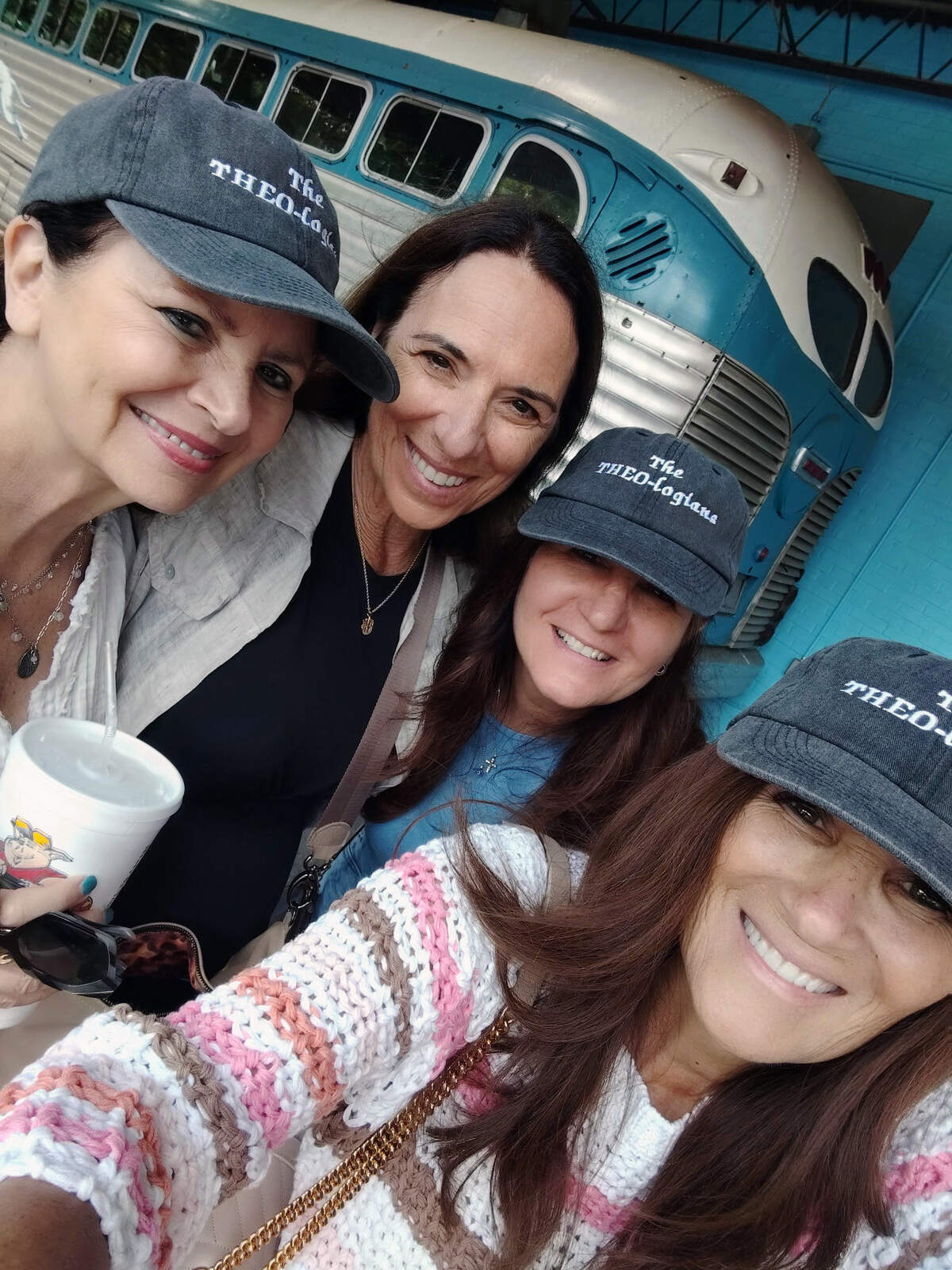 Linda Brandt, second from left, had “THEO-logians” hats made for the “Theo of Golden” trip from Florida to Columbus with her friends Roxanne Connor, Suzanne Mavrakos and Kim Crist.