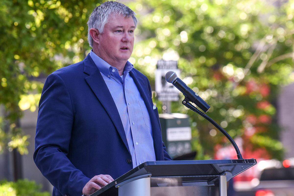 Pace Halter, president & chief operating officer of W.C. Bradley Co. Real Estate, welcomes guests attending the grand opening of The Currents at Riverfront Place on Wednesday morning. 05/01/2024