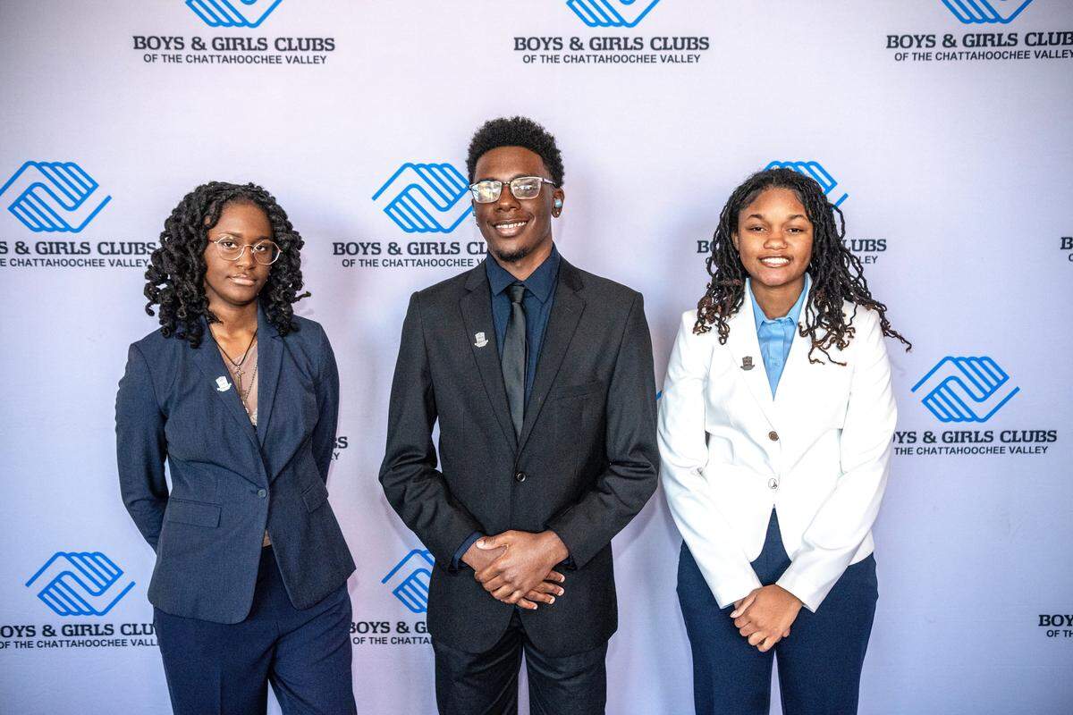 The finalists for the Boys and Girls Clubs of the Chattahoochee Valley Youth of the Year award pose Feb. 5, 2026, at the Bibb Mill Event Center: from left, Carver High School junior Treasje Bell, Northside High School junior Edwin Brown and Carver senior Breyana Anyaegbunam.