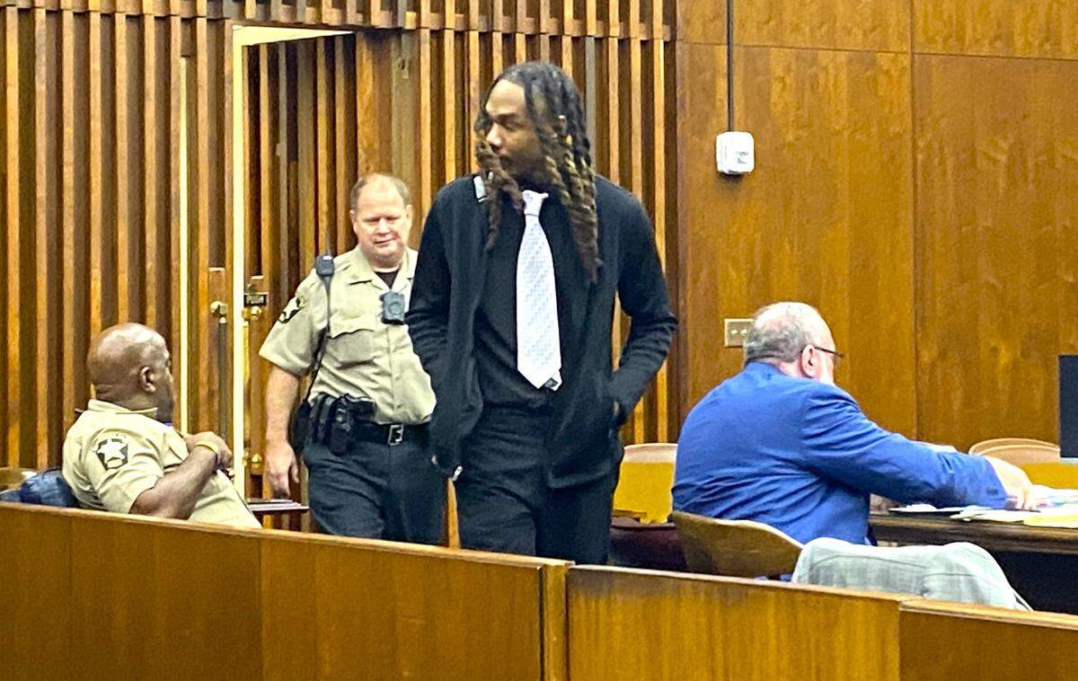 Quincy Wade walks back into the courtroom after a break in his Columbus murder trial.