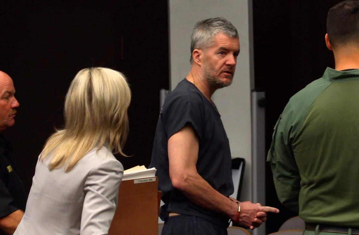 William “Bill” Talley III, left, leaves the courtroom Tuesday morning with his defense attorney Jennifer Curry after a bond hearing before Superior Court Judge Gil McBride. Talley is charged with murder in the May 11 fatal shooting of local paramedic Kelly Levinsohn.
