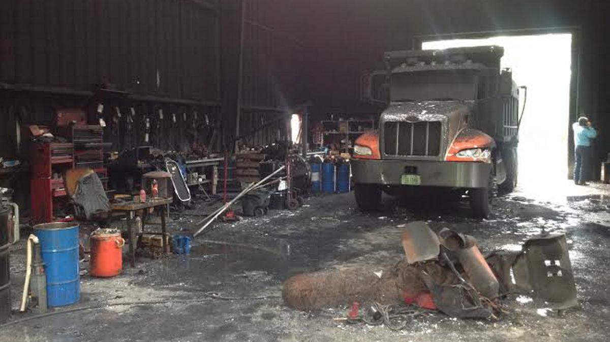 Photos by SARAH ROBINSON/srobinson@ledger-enquirer.comA fire at Bobby Stevens Hauling Contractor, 3223 Smith Road, left behind $200,000 worth of damage.