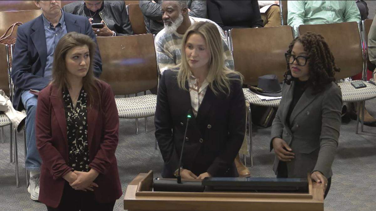 Columbus Airport director Amber Clark, left, attorney Alston Auten, center, and Columbus Airport Commission vice chairwoman Delois Dee Marsh speak to the Columbus Council during the Dec. 16, 2025, meeting.