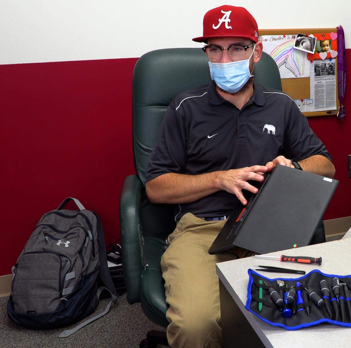 Randy Murphy, a technician in the Russell County School District’s technology department, said he likes helping to give teachers and students the resources they need to succeed.