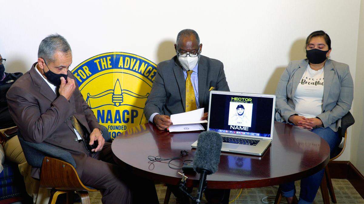 From left, Retired U.S. Army Sgt. Maj. Rodrigo Arreola, father of Hector Arreola, Wane Hailes, president of the Columbus, Georgia branch of the NAACP, and Patricia Ragan, sister of Hector Arreola, listen as a video about the death 2017 death of Hector Arreola.