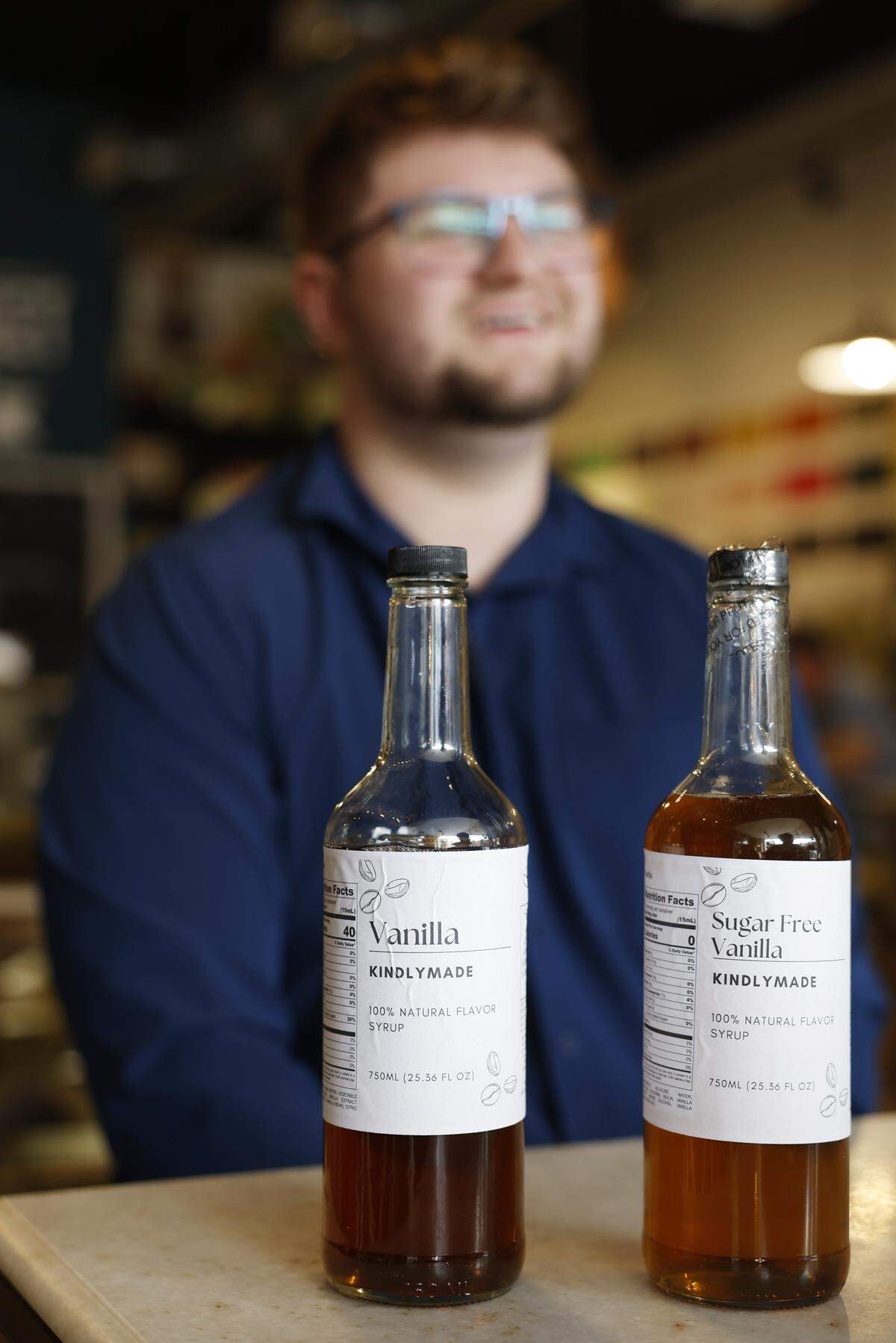 Troy Carson, a software engineer and Auburn University graduate from Opelika, has opened a small business selling his syrup brand, KindlyMade, pictured, Jan. 21, 2026. The syrup is being sold at The Food Mill in Columbus, along with other stores and markets in Phenix City, Opelika and Auburn.