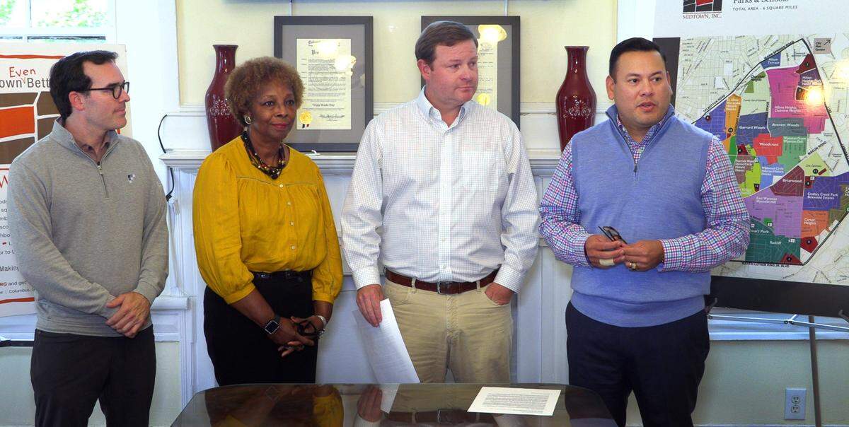 From left, Cameron Bean, Judy Tucker, Pete Berry, and Julio A. Portillo, Jr., answer questions at a Thursday morning press conference where MidTown Columbus announced the recent formation of the MidTown Neighborhood Alliance. 04/28/2023