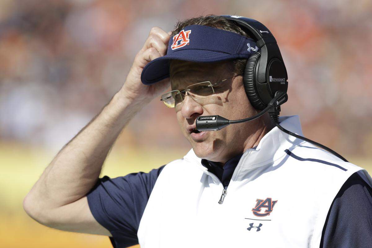 Auburn Coach Gus Malzahn won nine games and beat archrival Alabama last season. Is that enough to keep him off the hot seat this year regardless of how things play out for the Tigers?