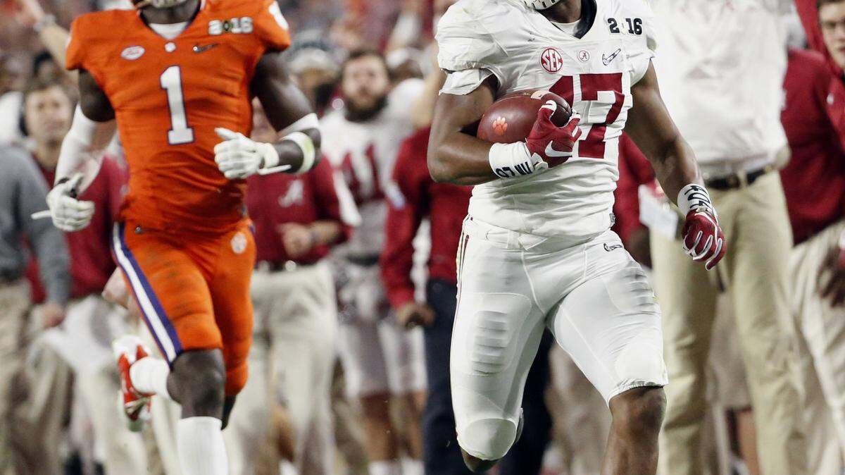 MICHAEL CHOW/The Arizona Republic via APAlabama's Kenyan Drake, right, breaks away for a touchdown return against Clemson's Jayron Kearse during the second half of the NCAA college football playoff championship game Jan. 11 in Glendale, Ariz.