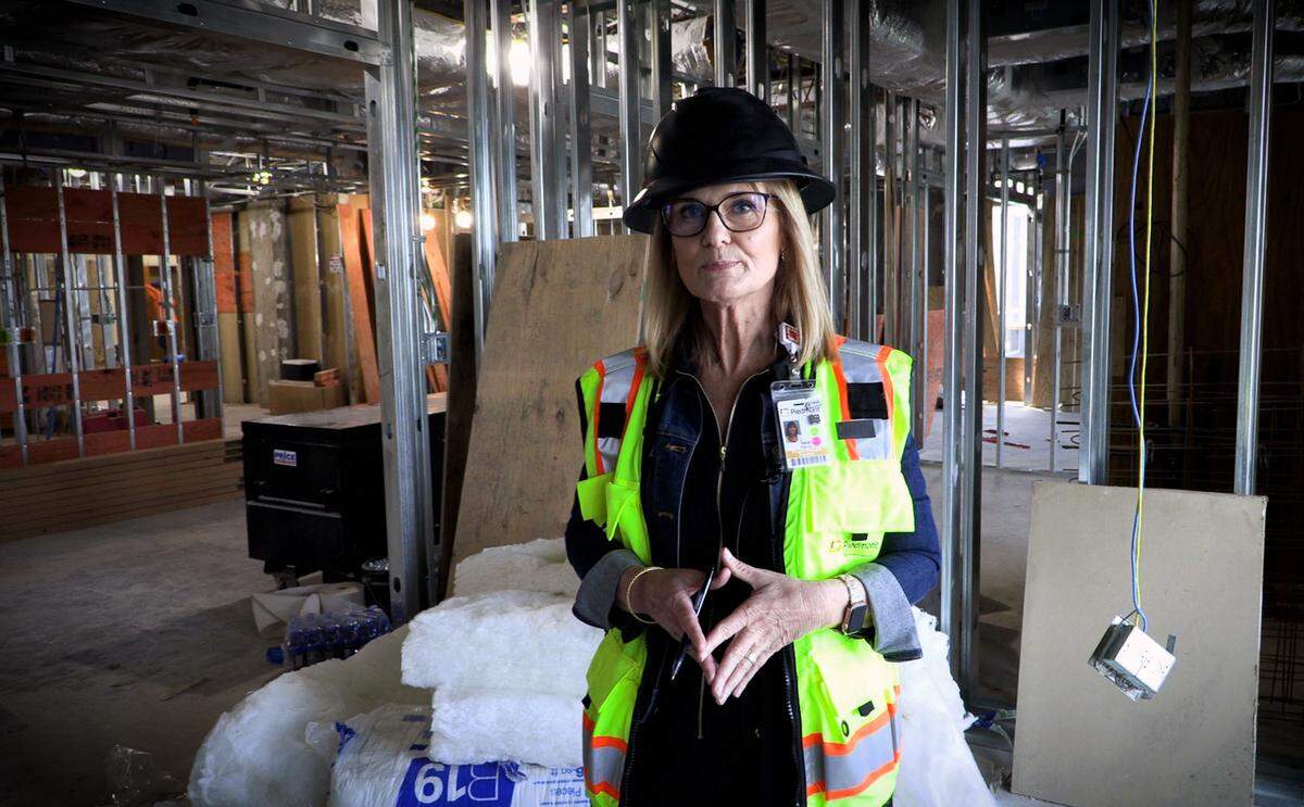 Heidi Harris, facilities project manager at Piedmont Columbus Regional in Columbus, gives a tour of the Bill and Olivia Amos Children’s Hospital that’s under construction in Columbus, Georgia. 04/08/2024