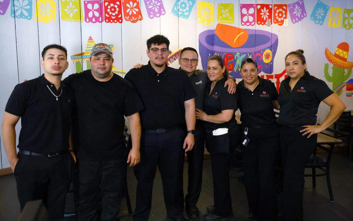 The staff of Molcajete Mexican Restaurant pose for a group photograph Oct. 15, 2025. Molcajete is at 5237 Route 219 in Fortson.