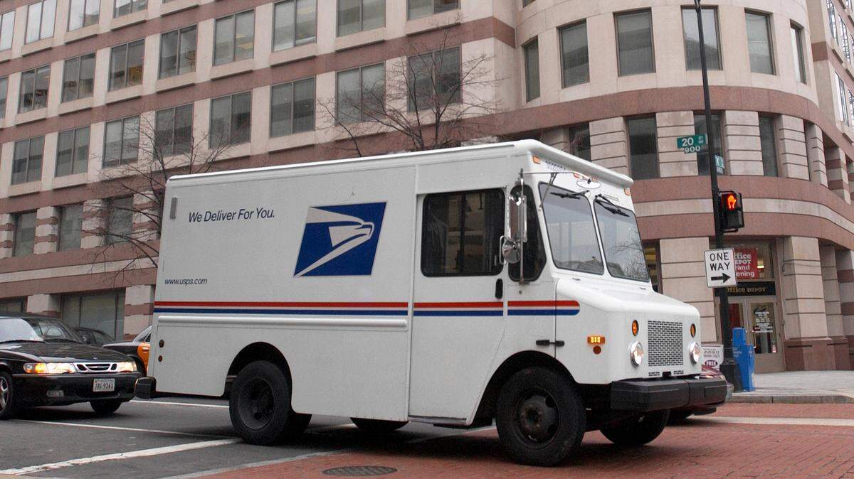 A USPS delivery truck on a route