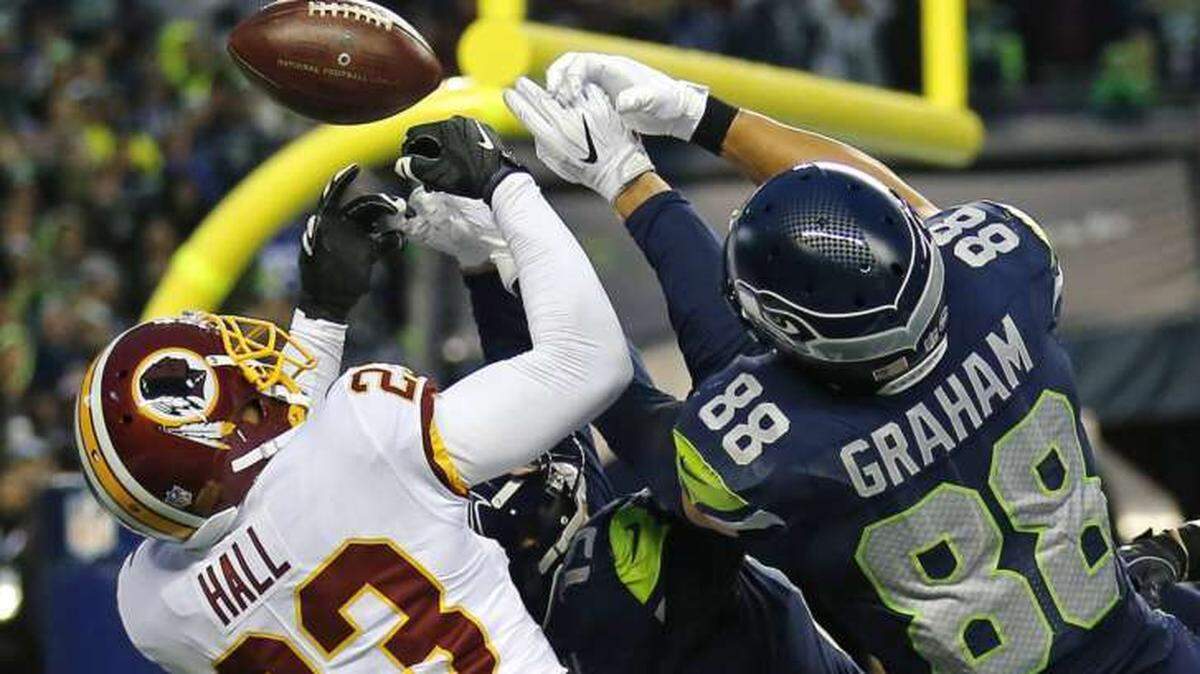 Washington Redskins free safety DeAngelo Hall (23) breaks up a pass in the end zone intended for Seattle Seahawks tight end Jimmy Graham (88) at the end of an NFL football game, Sunday, Nov. 5, 2017, in Seattle. Washington won 17-14