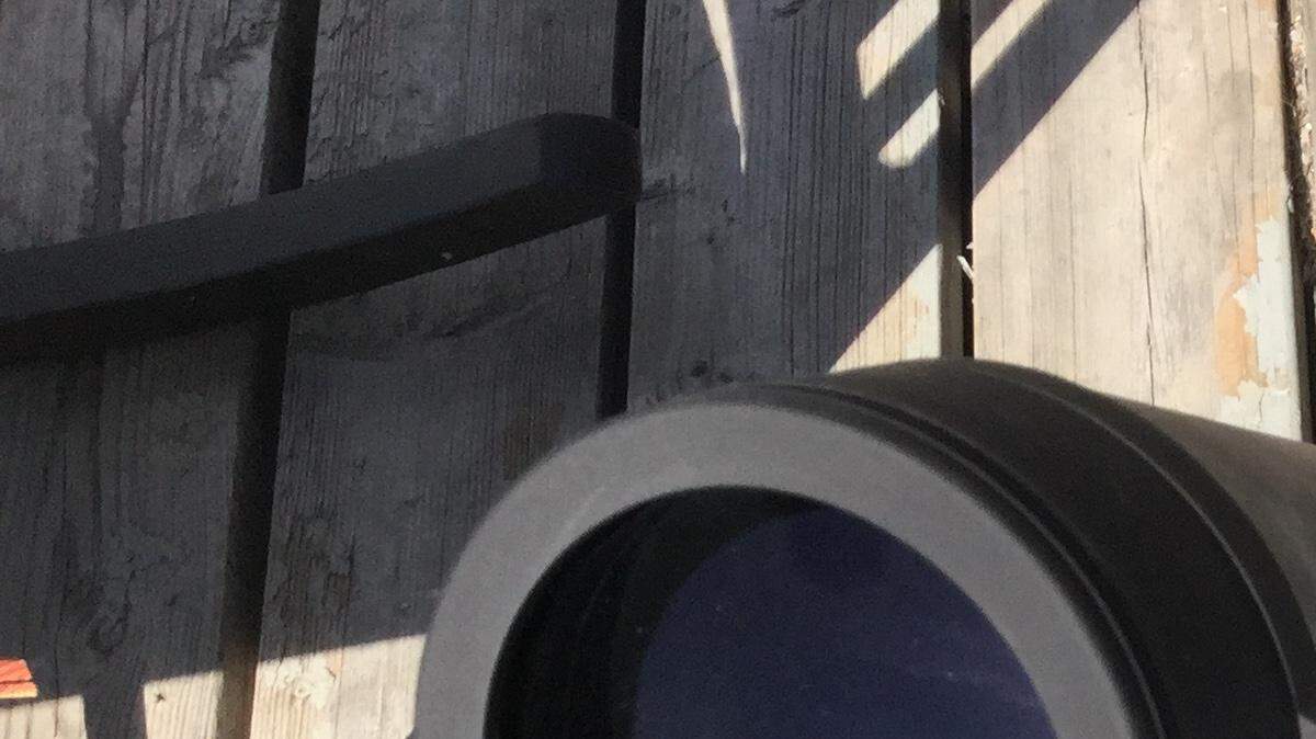 Tim Chitwood watched the eclipse in Montana using binoculars and a piece of paper.