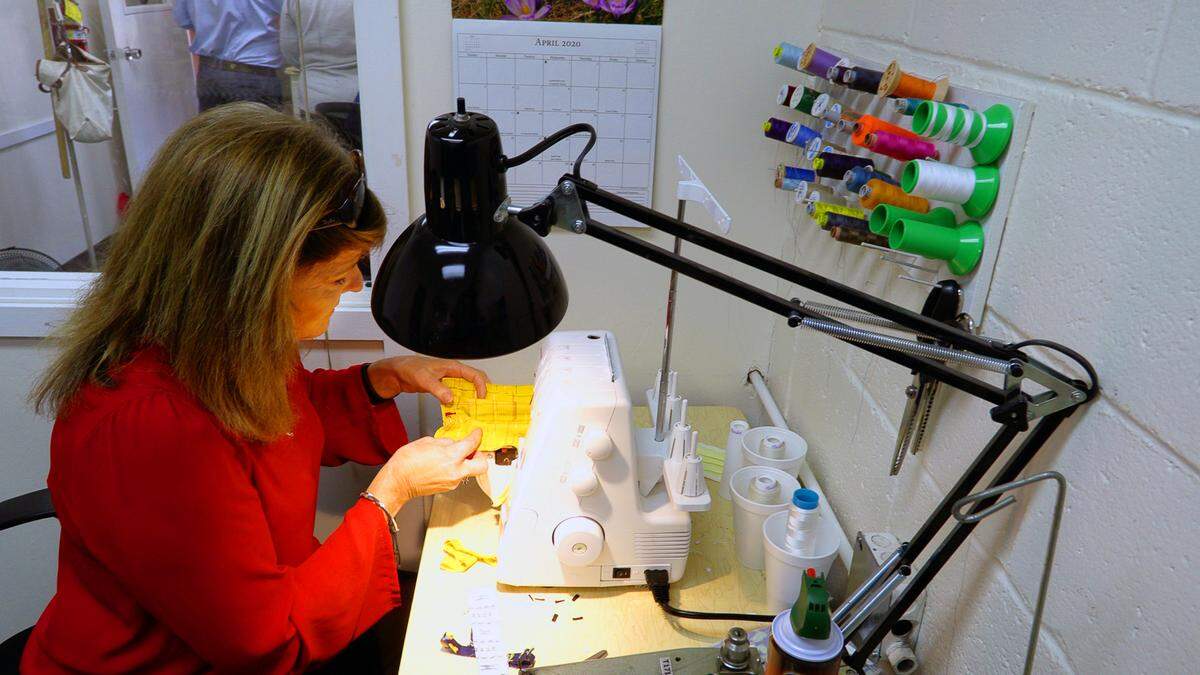 Cissy Wade Clark, cleaners manager at the Wade Companies, works on a mask. The Wade Companies has been a family-owned business since being established in 1939 as Wade Dry Cleaning Company. They’re now making Personal Protective Equipment(PPE) to help the community and offset the slowdown caused by the coronavirus pandemic.